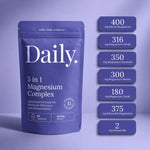 A blue stand-up pouch labeled 'Daily. 5 in 1 Magnesium Complex' shown on a lavender background, with a vertical list of supplement claims to the right detailing magnesium and vitamin B6 amounts.