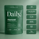 VitamoreD Calcifediol Supplement pouch showing 'Daily Vitamored' dietary supplement and food supplement stands against a matching green background, with six dark green callout boxes on the right listing key features: 10 mcg Vitamin D3, Calcifiediol form of D3, 3.2x more potent, 600 mcg per pouch, 60 tablets, and 5x better absorbed.